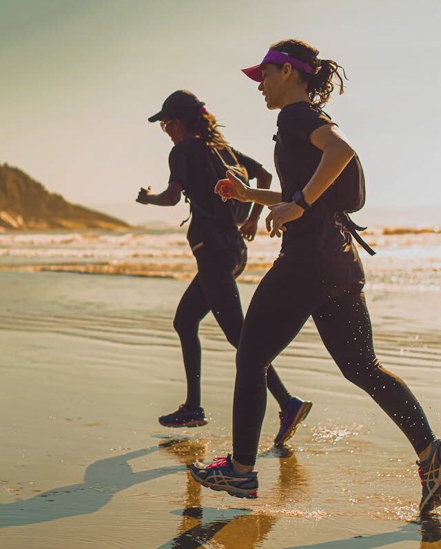 Brisk Walking of Two Person at the Beach